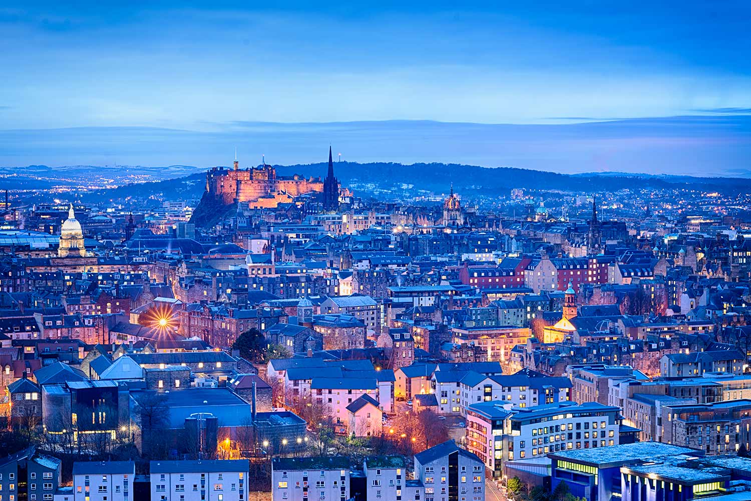 Edinburgh during really cold winter night from Salisbury Crags. HDR photo by Iain Robinson