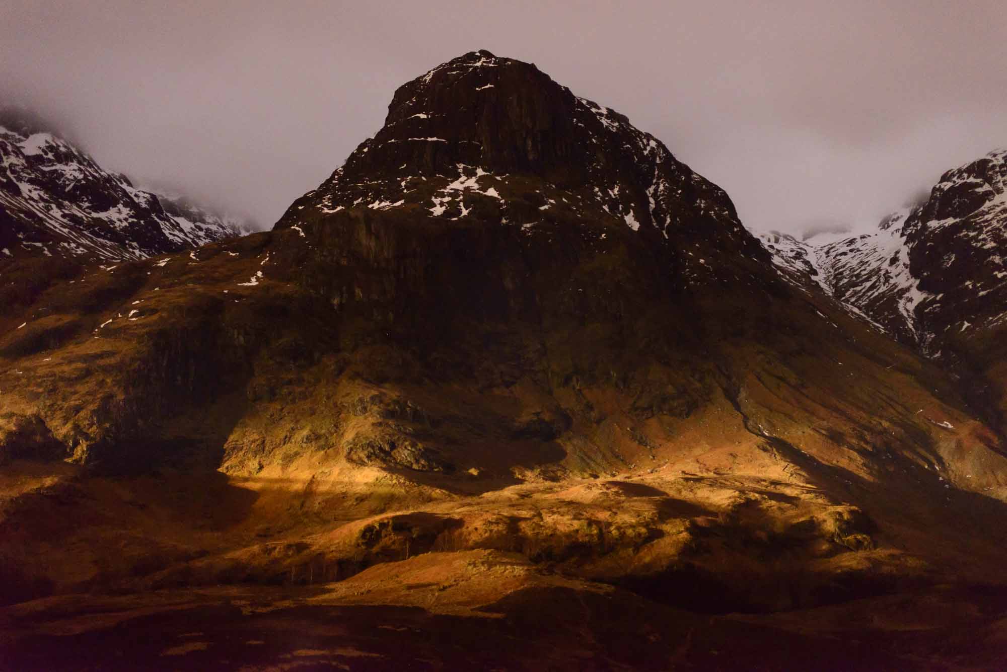 Atmospheric photo of mountains in Glen Coe. From A82 Road to Loch Leven, 2016.